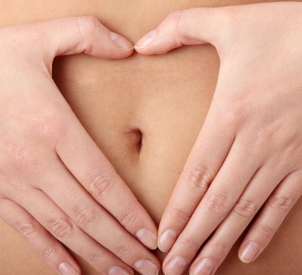 Woman's Fingers Touching her body parts, heart shaped fingers